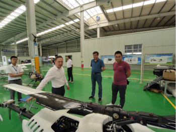 呼伦贝尔城投集团董事长柴冠辉率团考察尊龙凯时ag科技